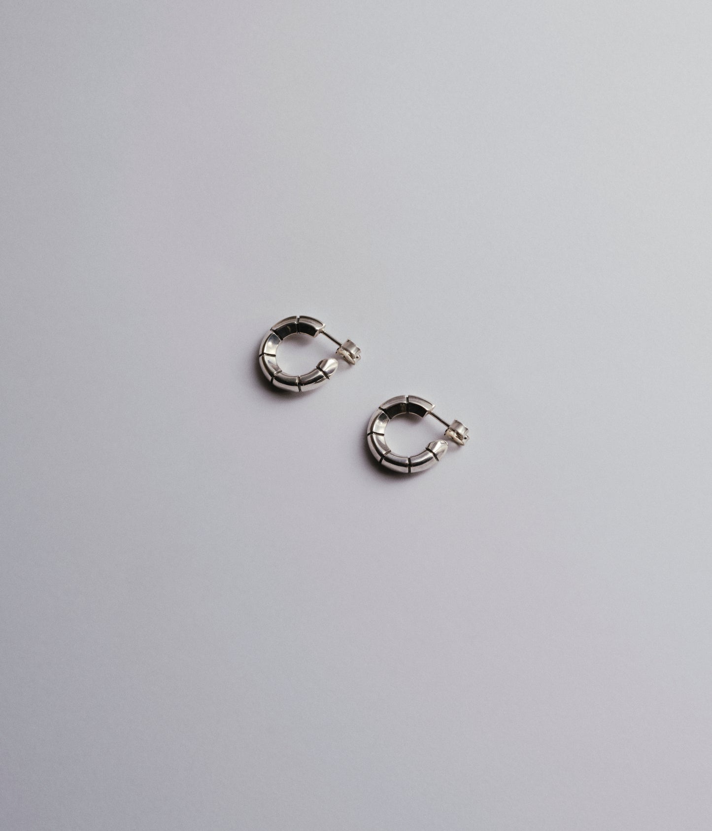 Meassuring tape earring silver